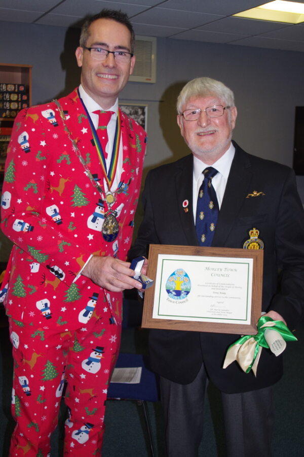 Photo of Tony Keay being presented award